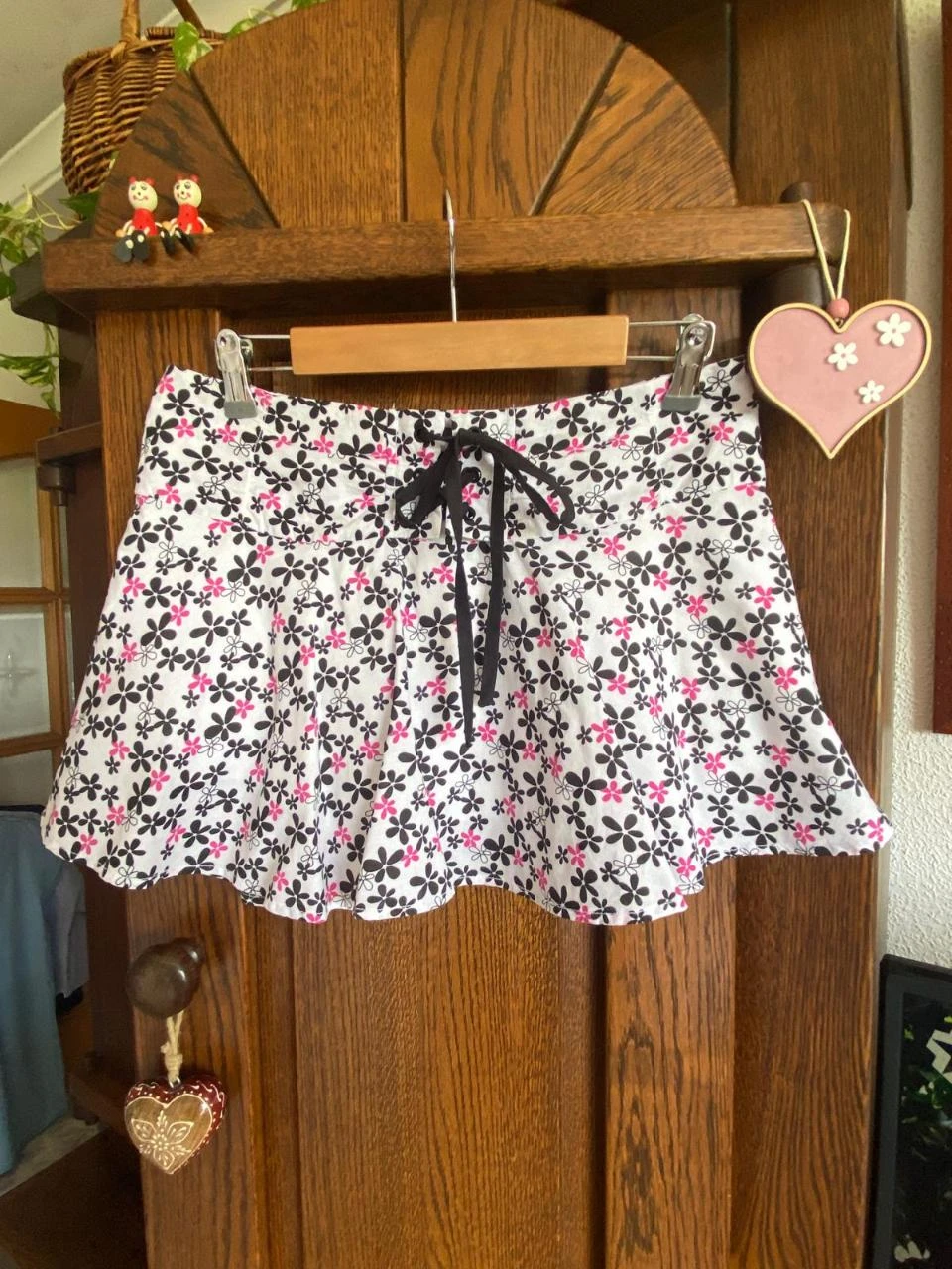 Minissaia evasé com estampa floral. Fishbone. Tamanho PP – photo 2